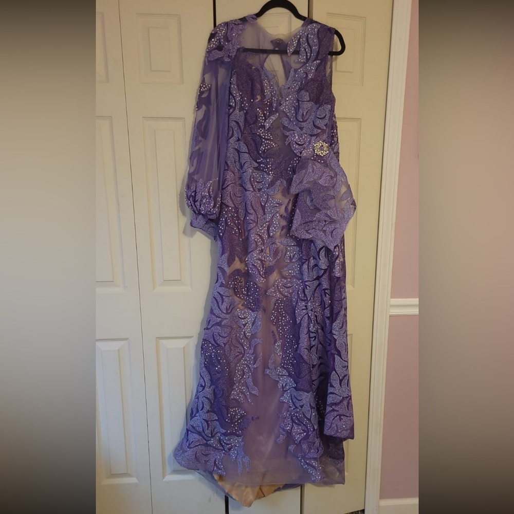 Size 10 beautiful gown fully detailed. Has been altered to a 12.